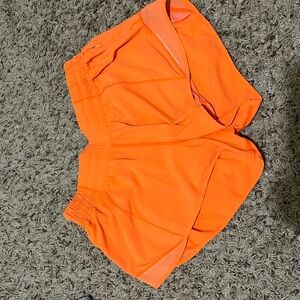 neon orange lululemon shorts